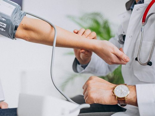 Blood pressure being checked during a health check-up at Bluebell Hospital